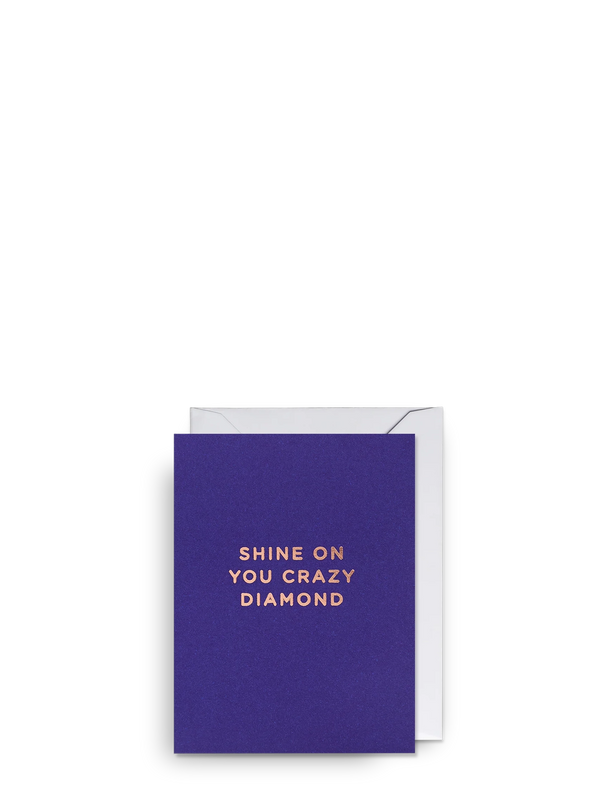 Blue card with 'Shine on you crazy diamond' text and white envelope on a white background