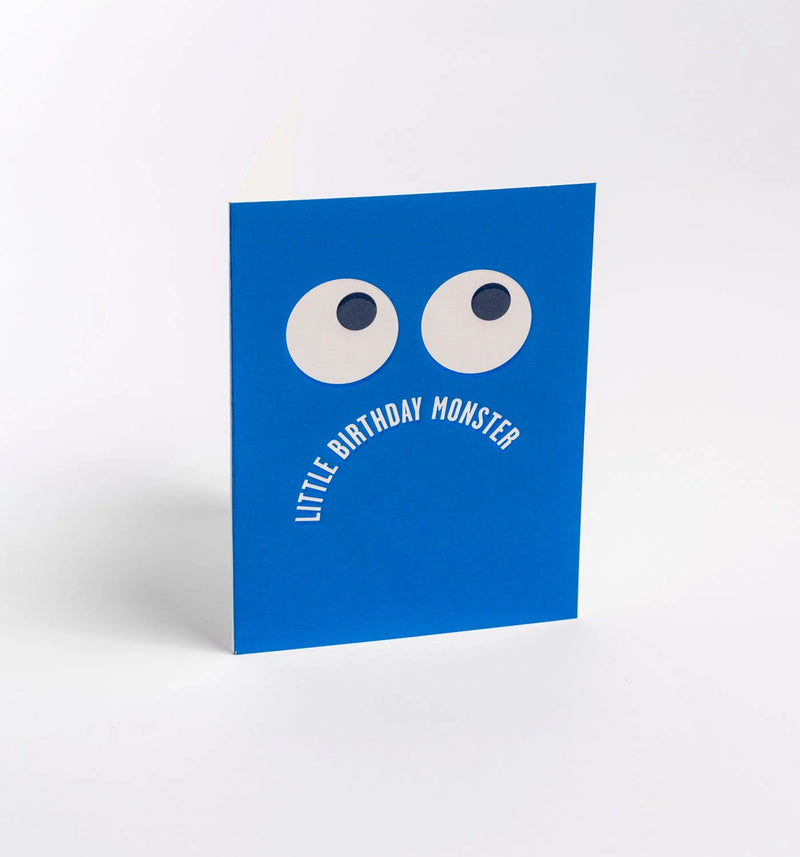 Blue card with googly eyes and 'Little Birthday Monster' text on a white background