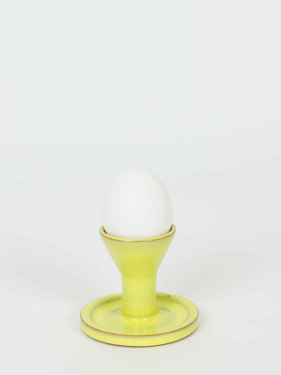 Atlas ceramic eggcup, yellow