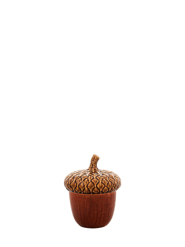 Decorative acorn-shaped container on a white background