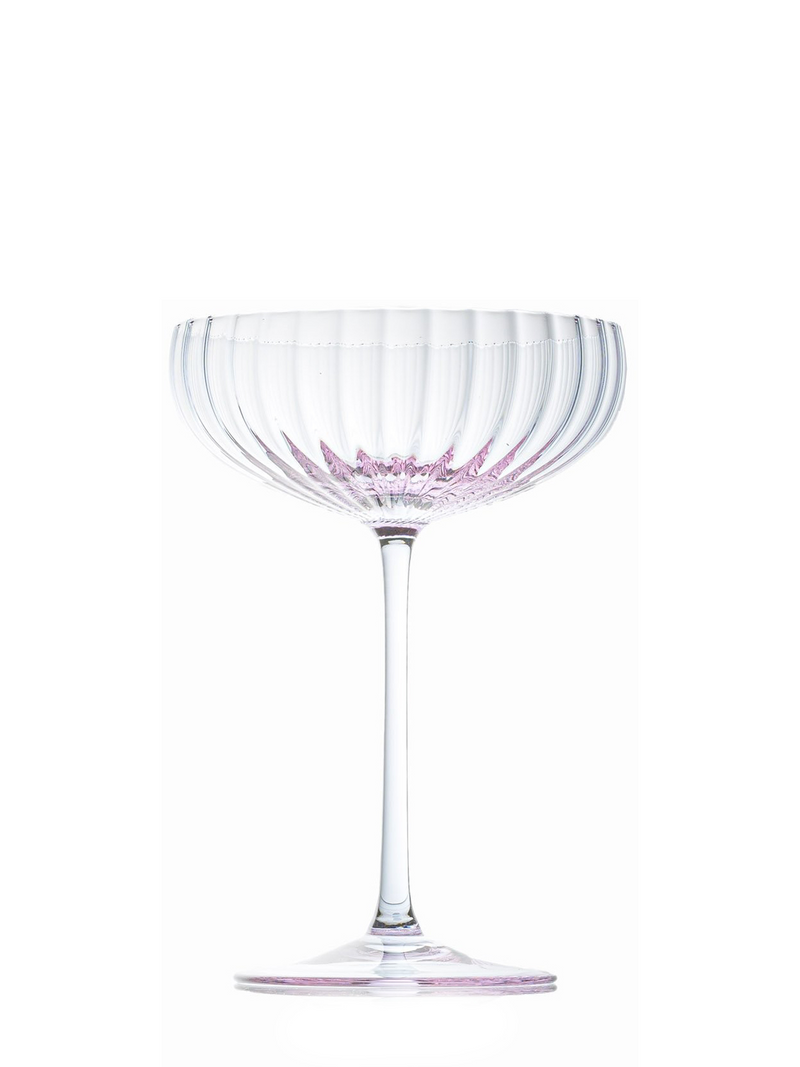 A mouth-blown lilac champagne glass with a rippled pattern, stem included, displayed against a white background.