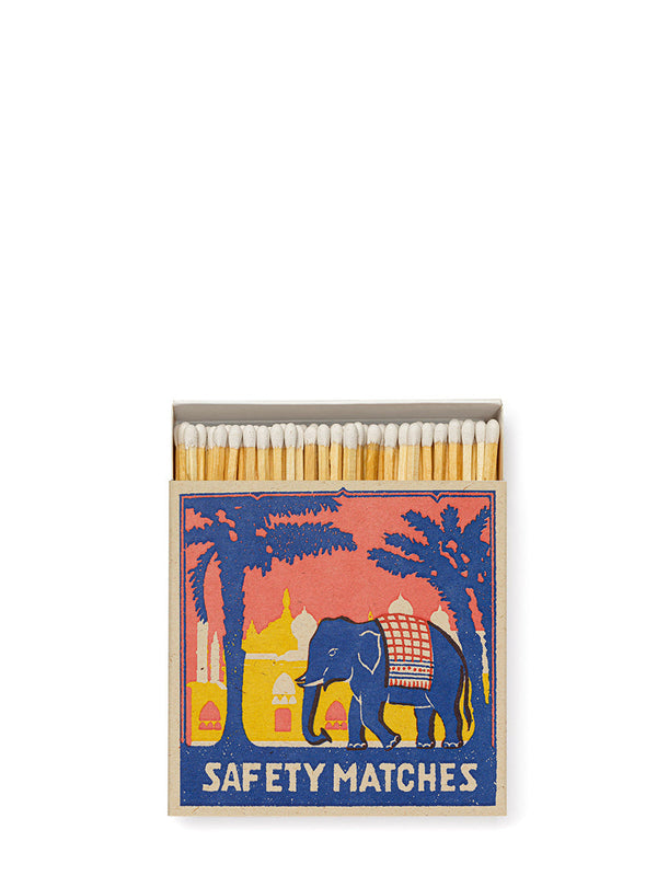 Matches with an elephant design on a white background