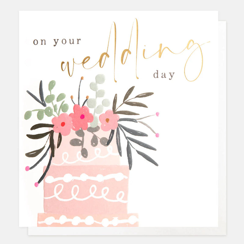On wedding day cake, wedding card