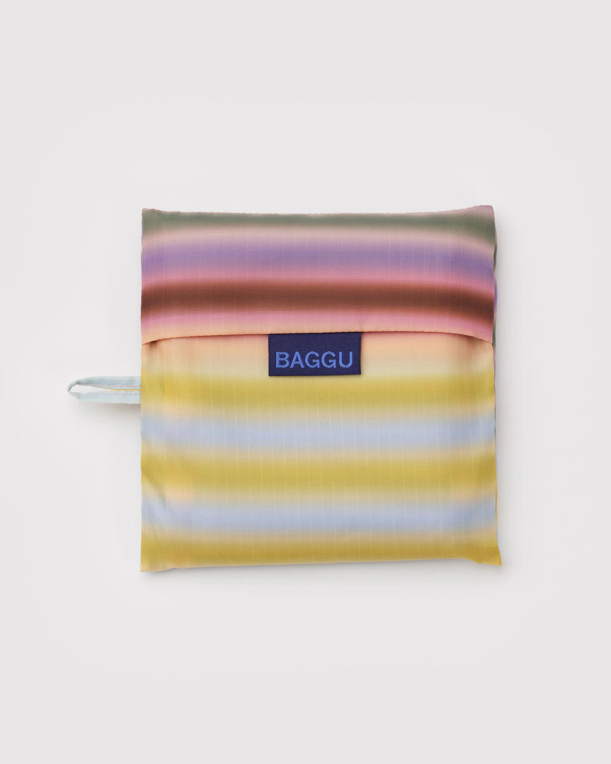 Multicolored striped bag with 'BAGGU' label on a white background