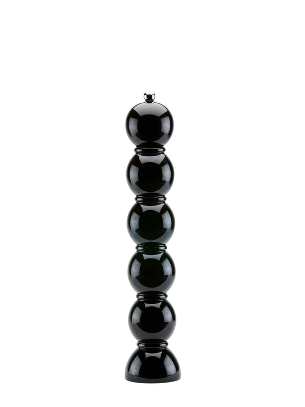Black cylindrical object on a white background