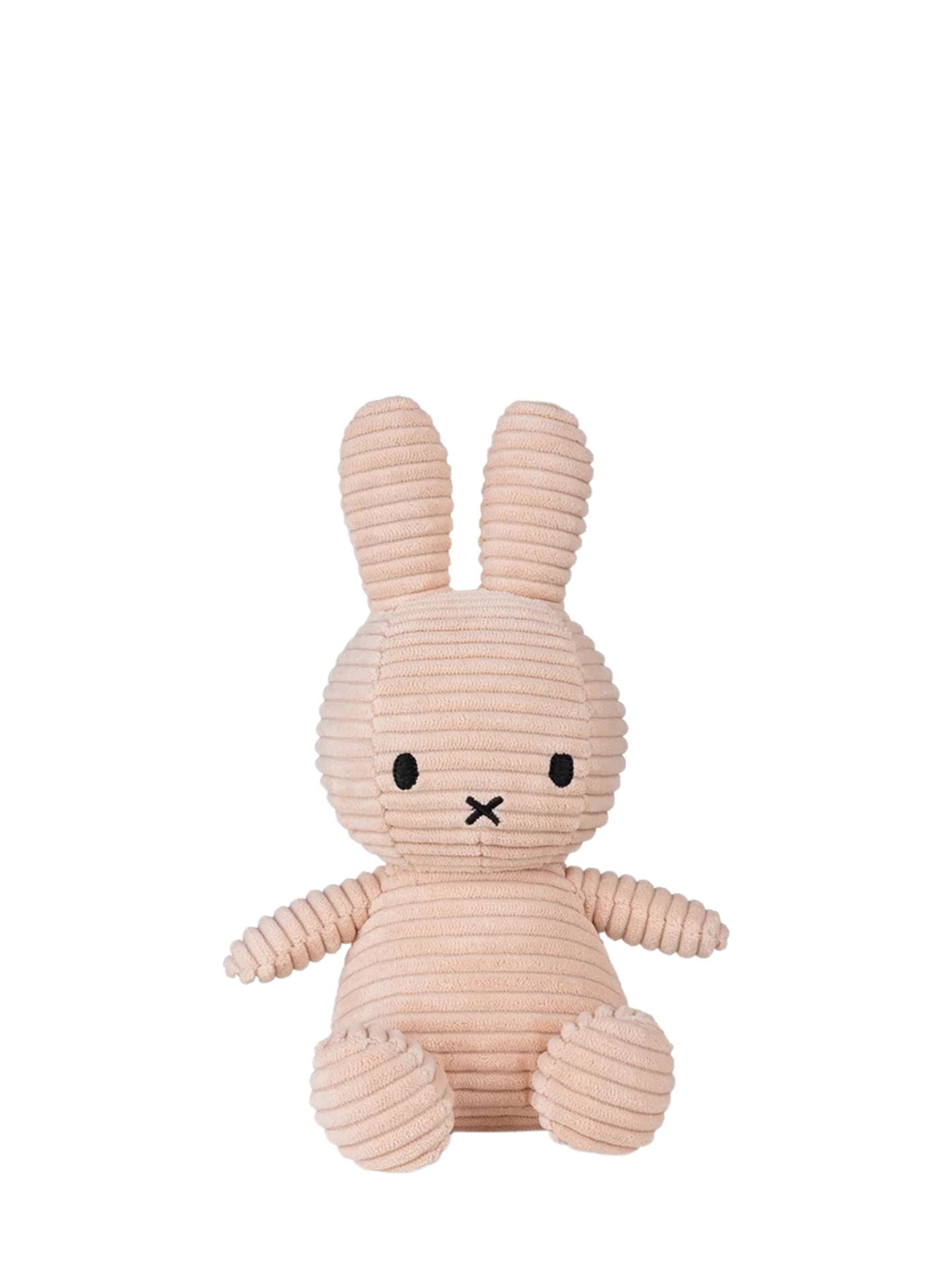 Pink plush miffy bunny toy on a white background