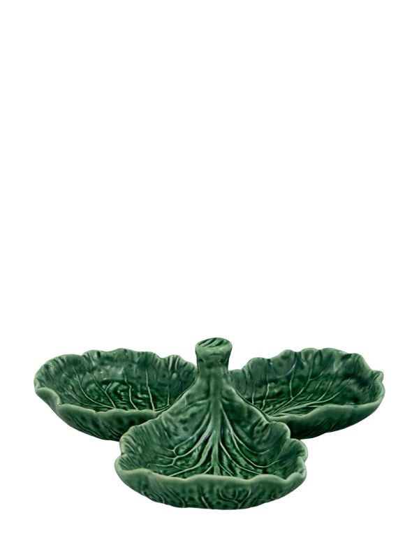 A green earthenware serving dish designed to resemble a cabbage leaf.