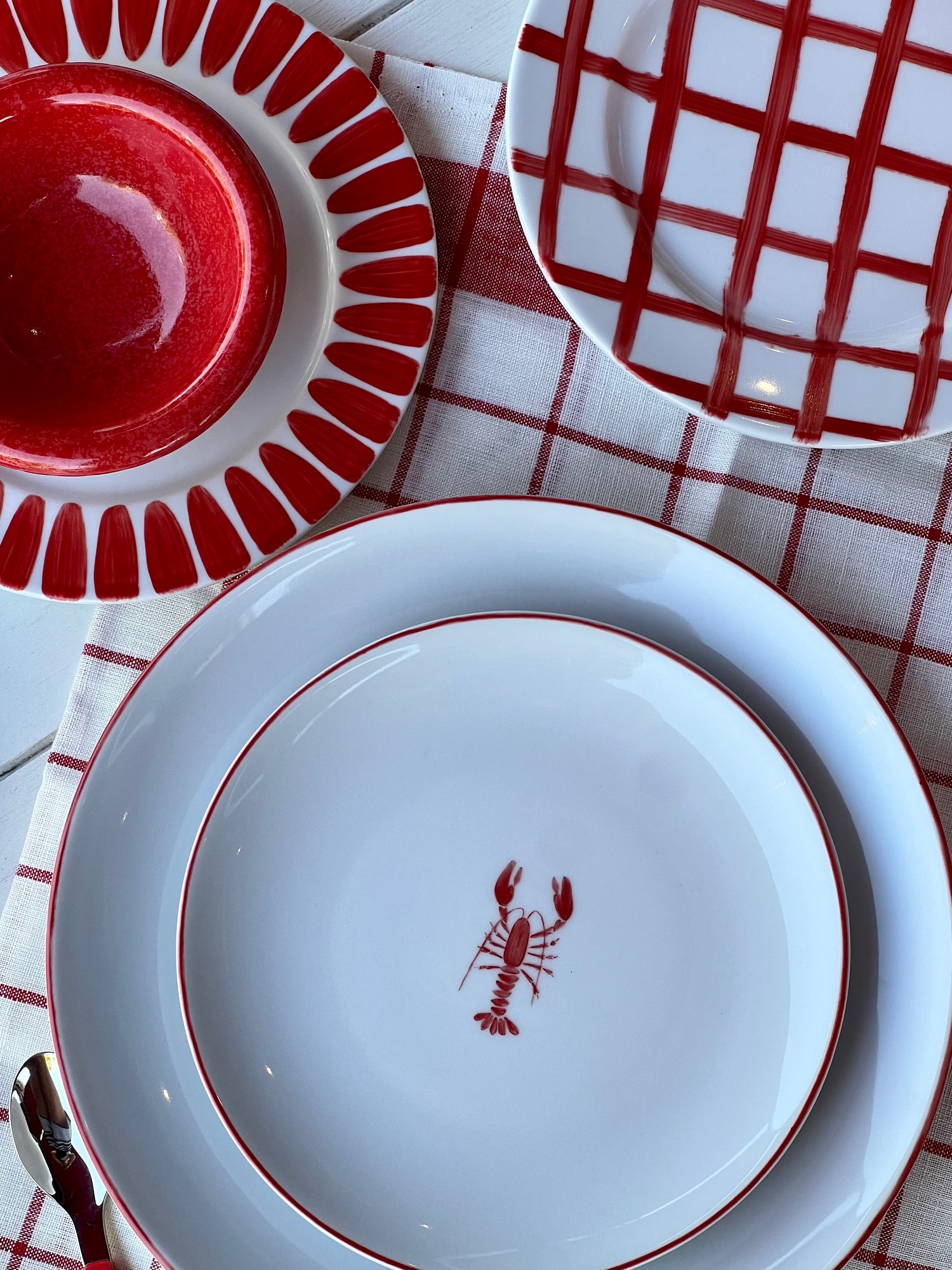 Red dessert plate with handpainted border