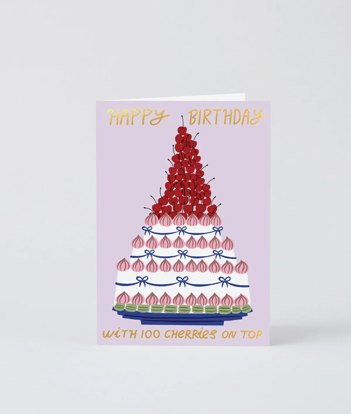 Birthday card with a cake illustration and cherry details on a white background