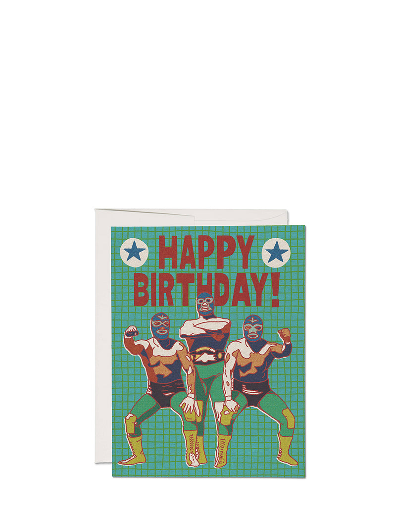 Birthday card with three superhero figures on a green checkered background