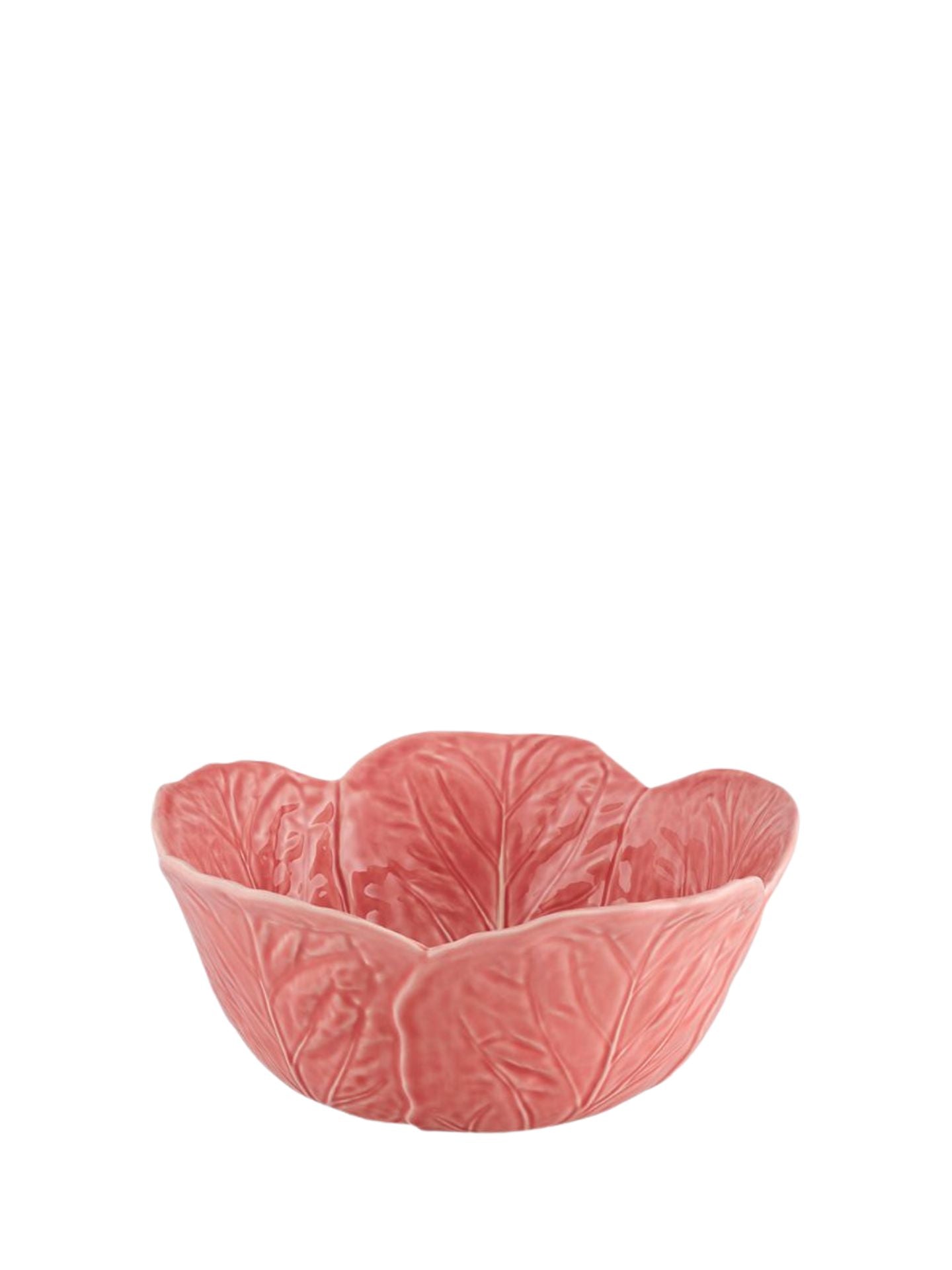Pink ceramic bowl with leaf pattern on a white background