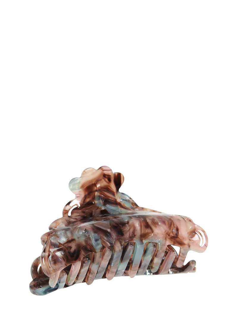 A multicolored hair claw made of acetate, featuring a blend of brown, blue, and green hues.