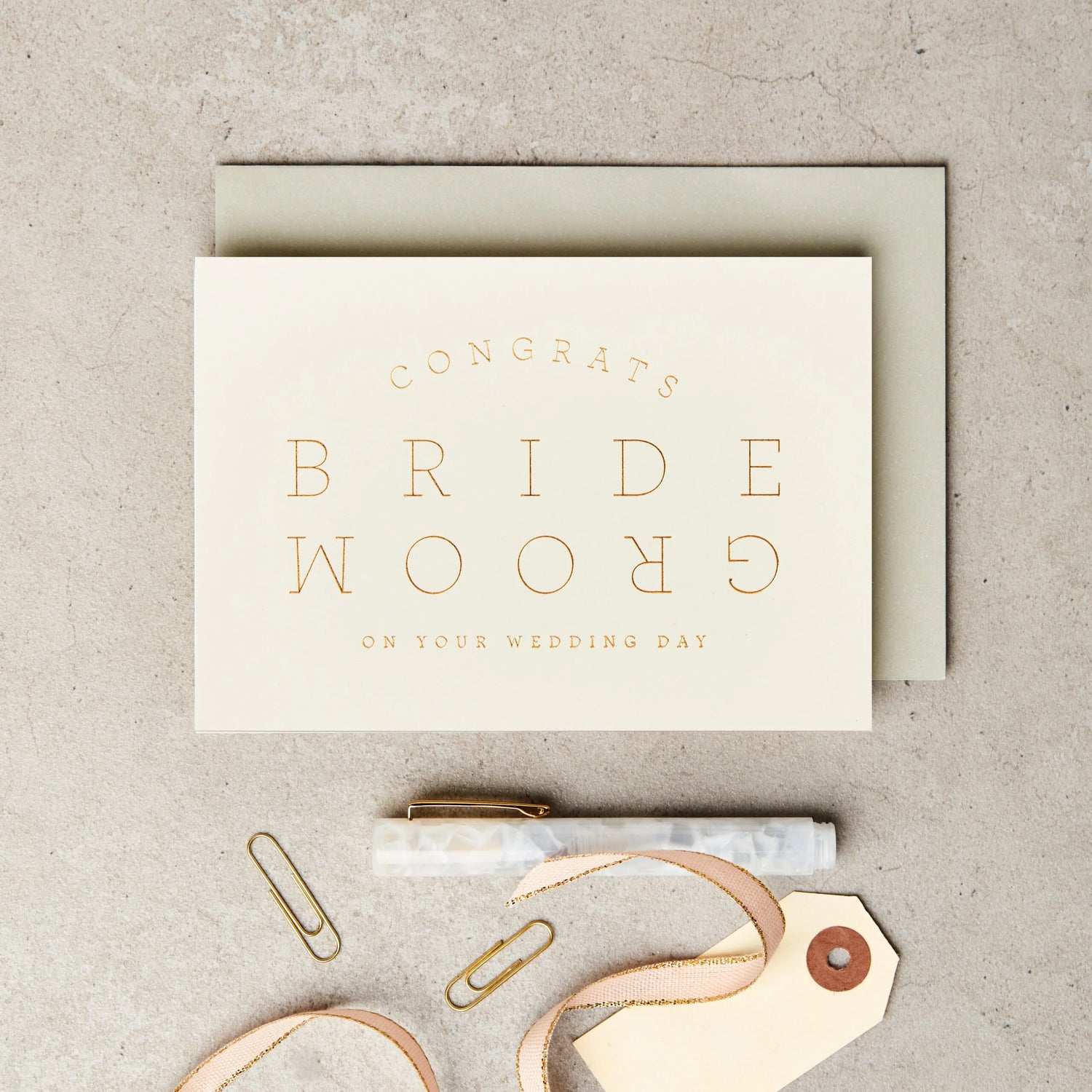Extract letters bride & groom gold-ivory wedding card