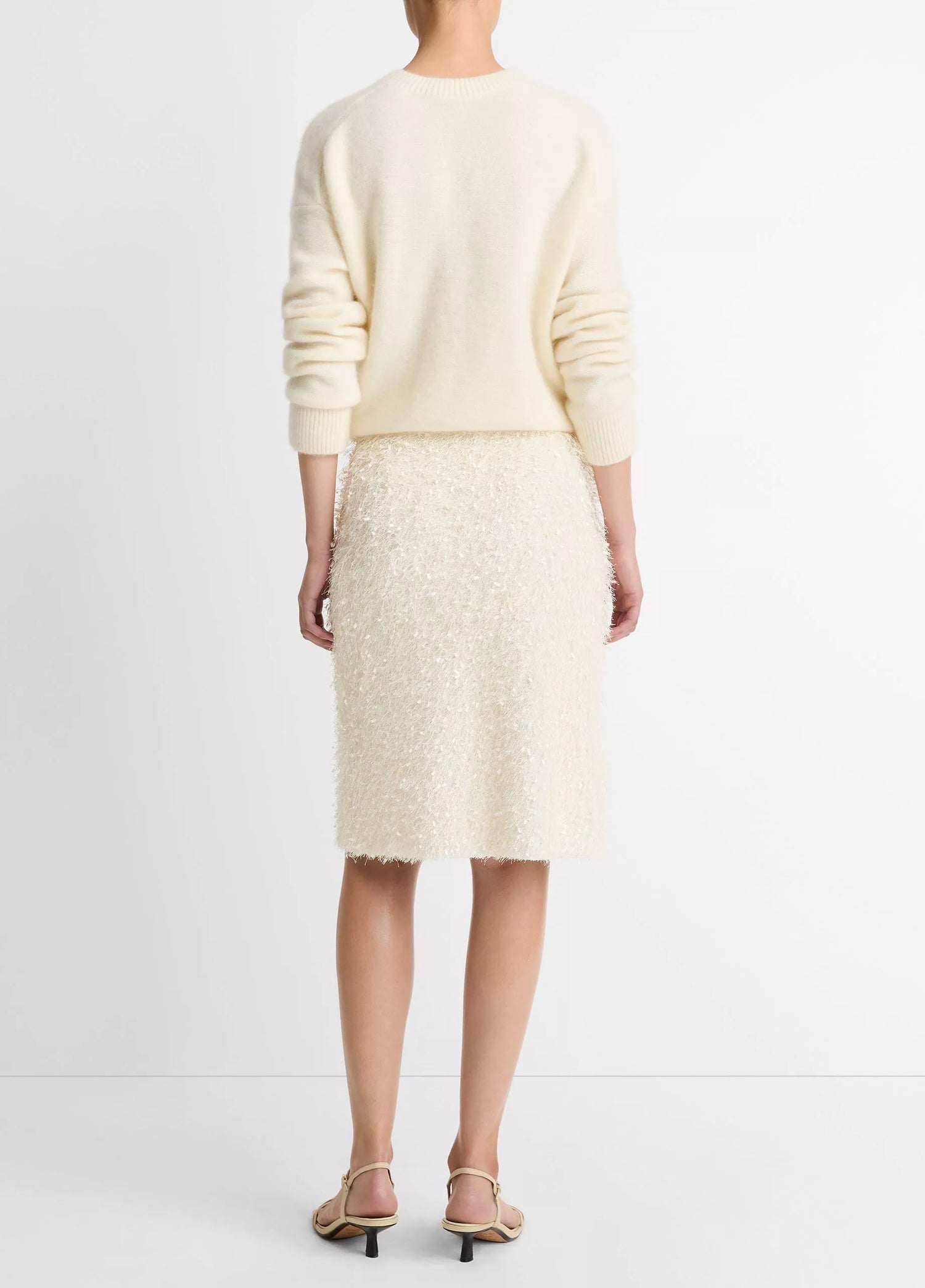 Feathery fringe above knee skirt, cream