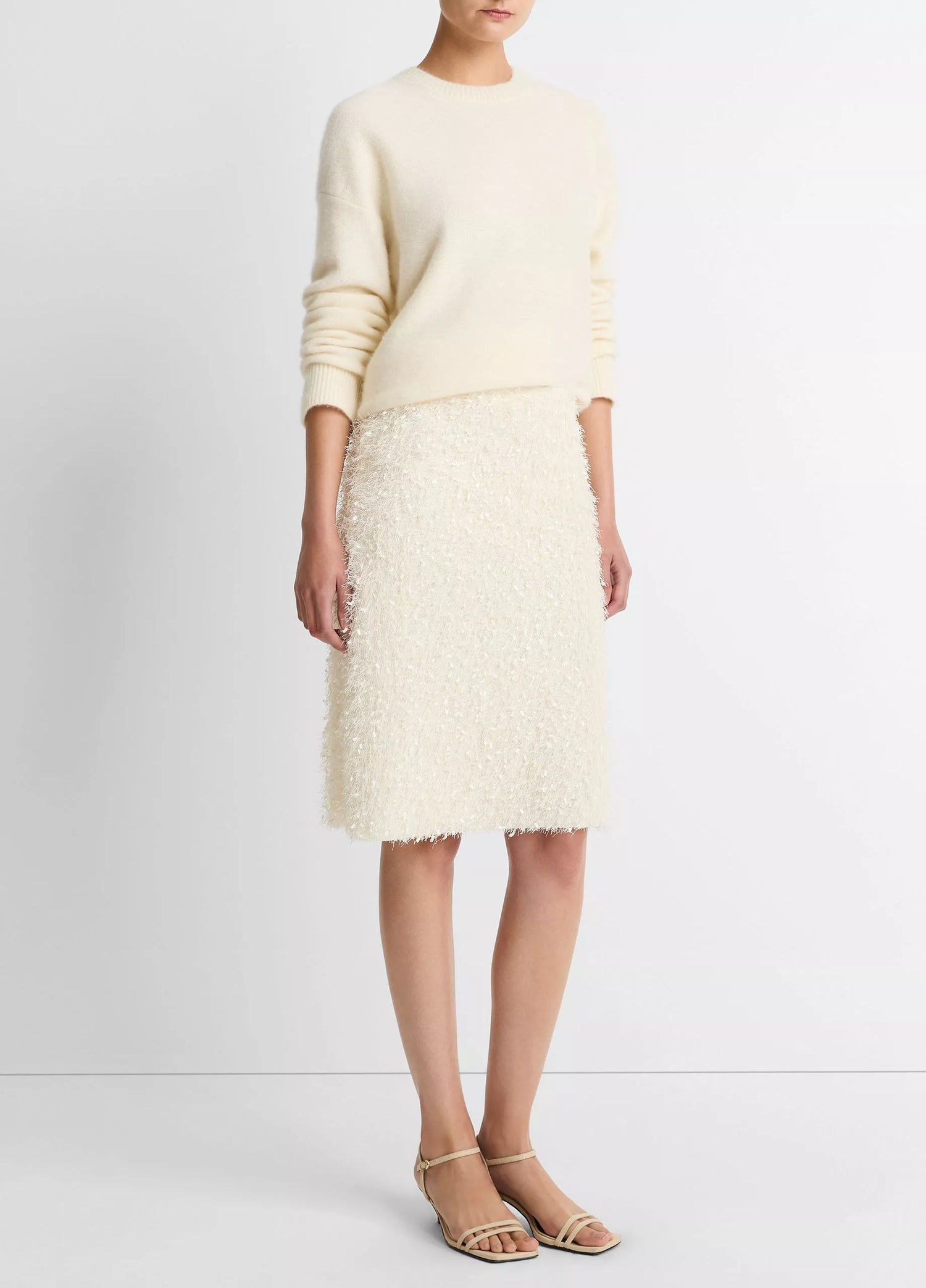 Feathery fringe above knee skirt, cream