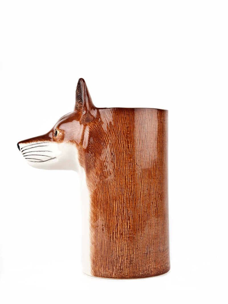 Fox-shaped ceramic pot on a white background