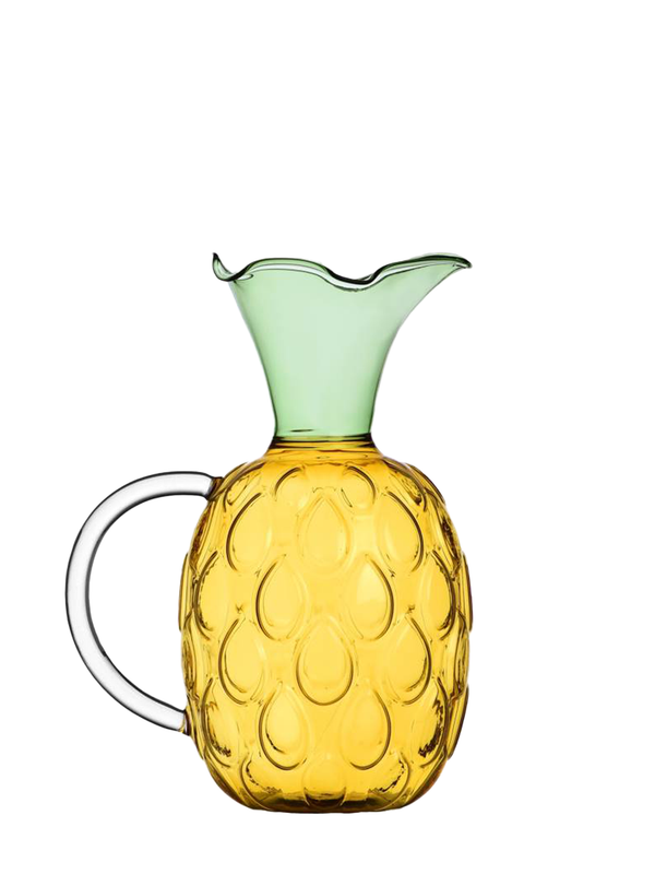 A handblown glass water jug designed in the shape of a pineapple, with a green top and yellow body, by Alessandra Baldereschi.