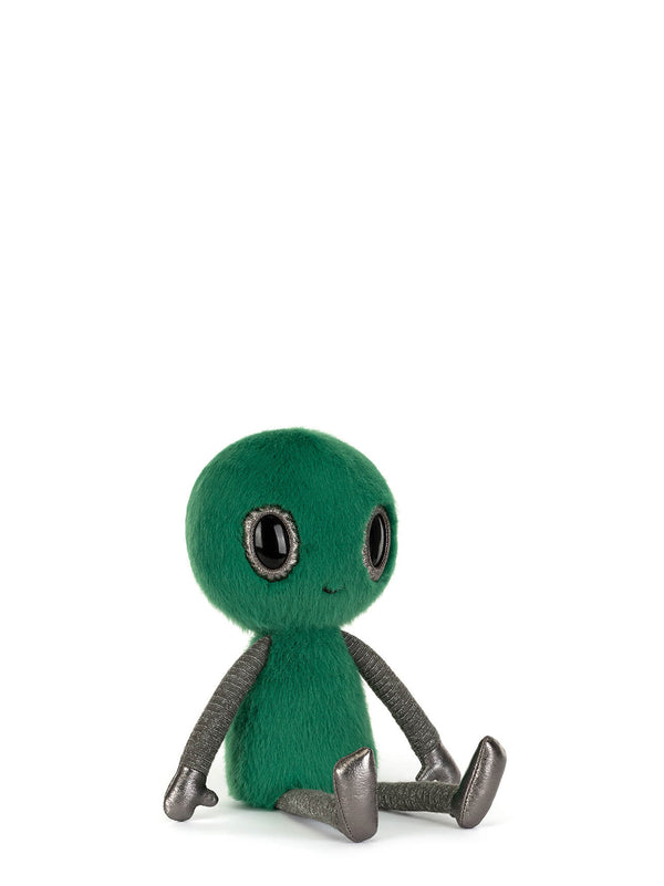 Green alien plush toy on a white background