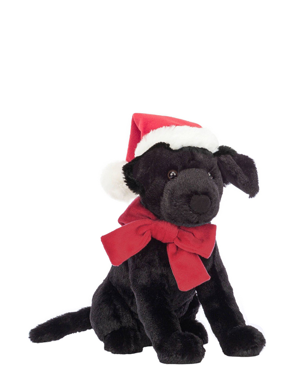 A plush black Labrador dog toy with a red bow and a Santa hat.