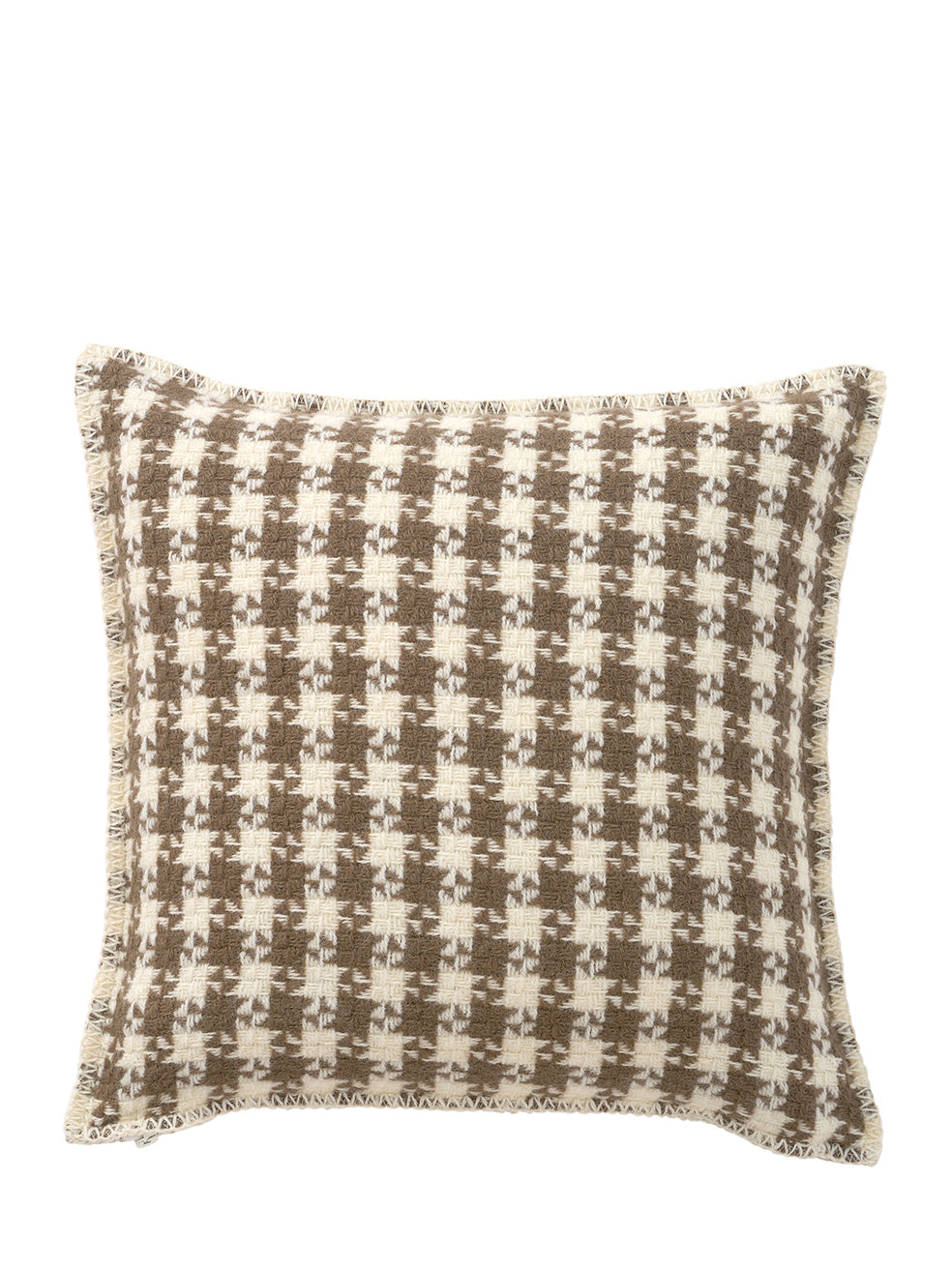 Decorative pillow with a houndstooth pattern on a white background