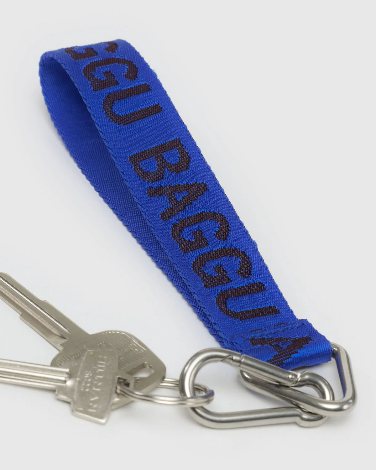 Blue keychain with 'BAGGUA' branding on a white background