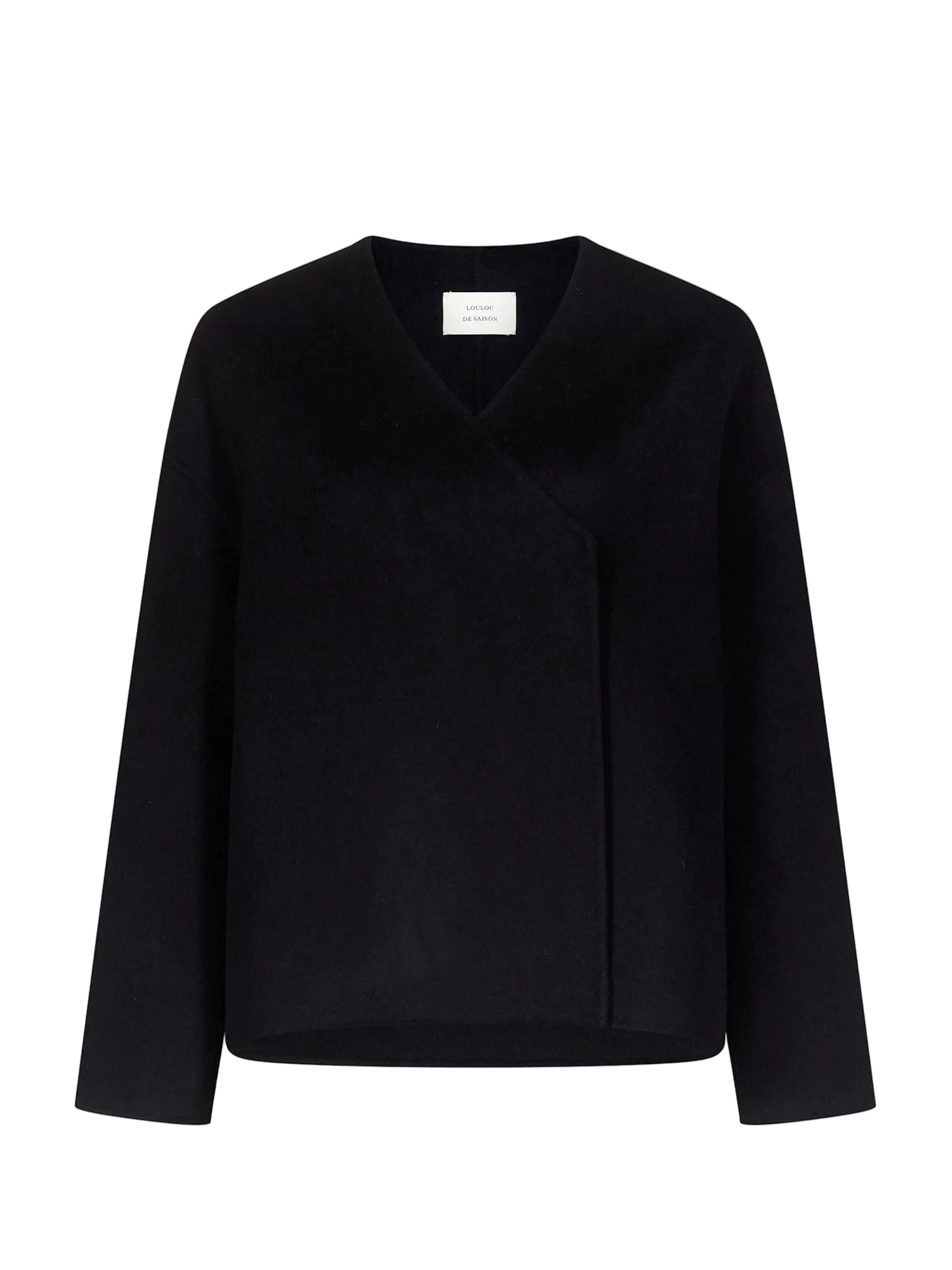 Black sweater on a light gray background