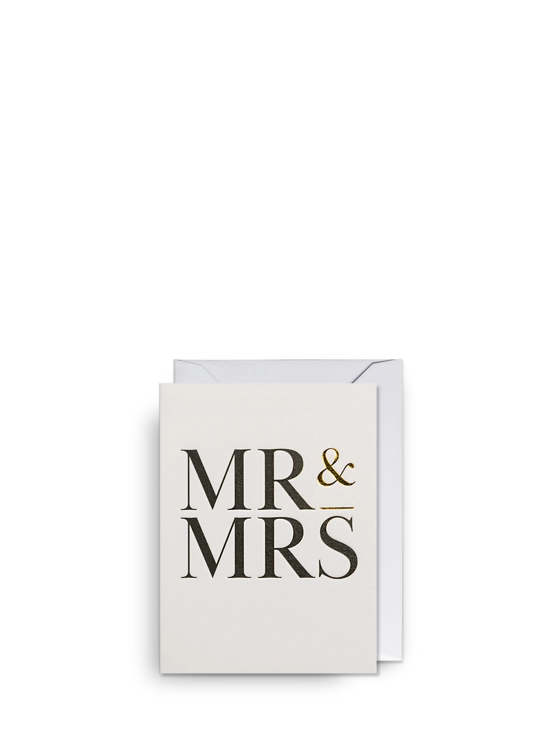 A mini wedding card with 'Mr & Mrs' text in a cursive font, embossed on the front, with a blank inside for a personal message, paired with a matching envelope.