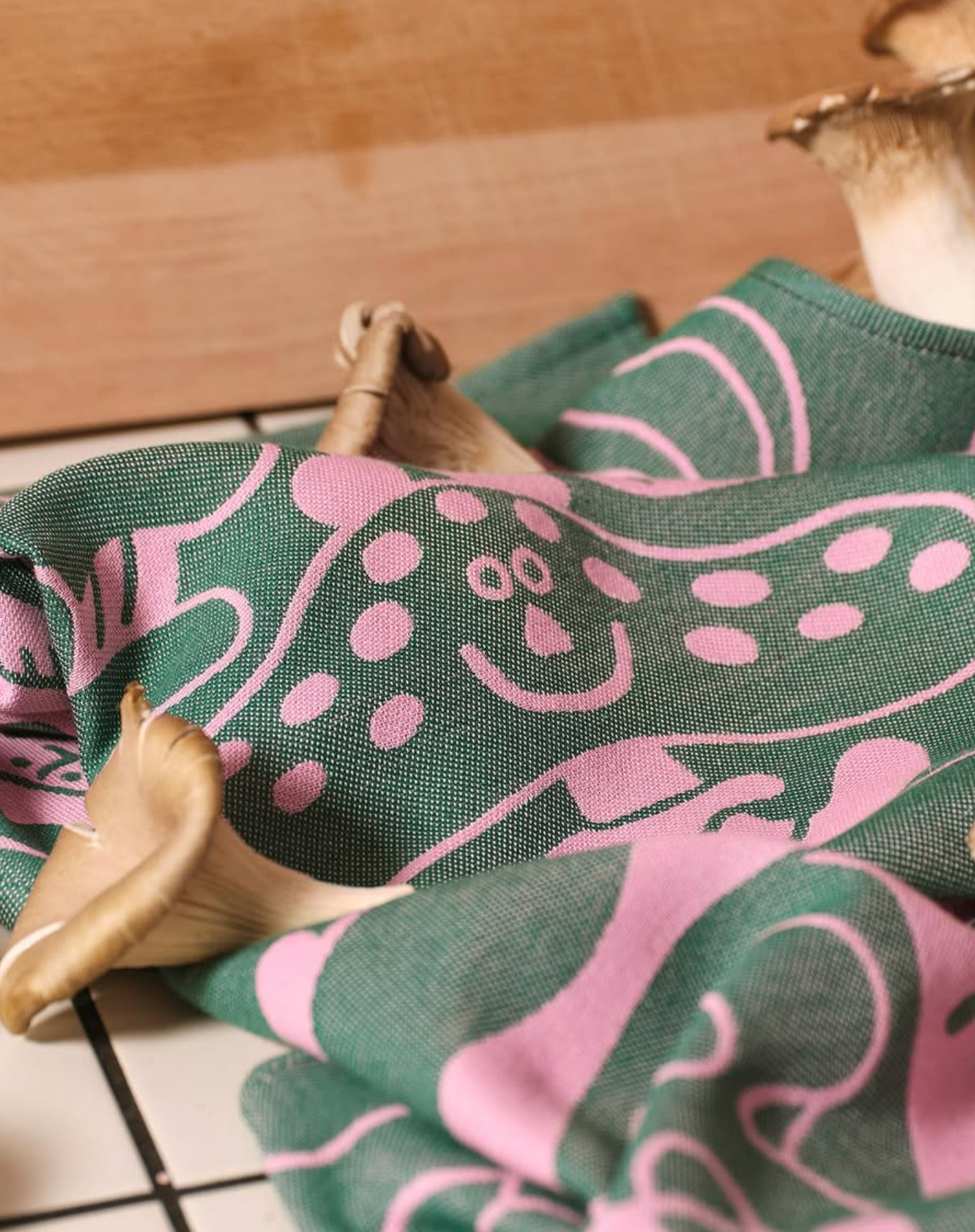 Mushrooms tea towel, pink and dark green