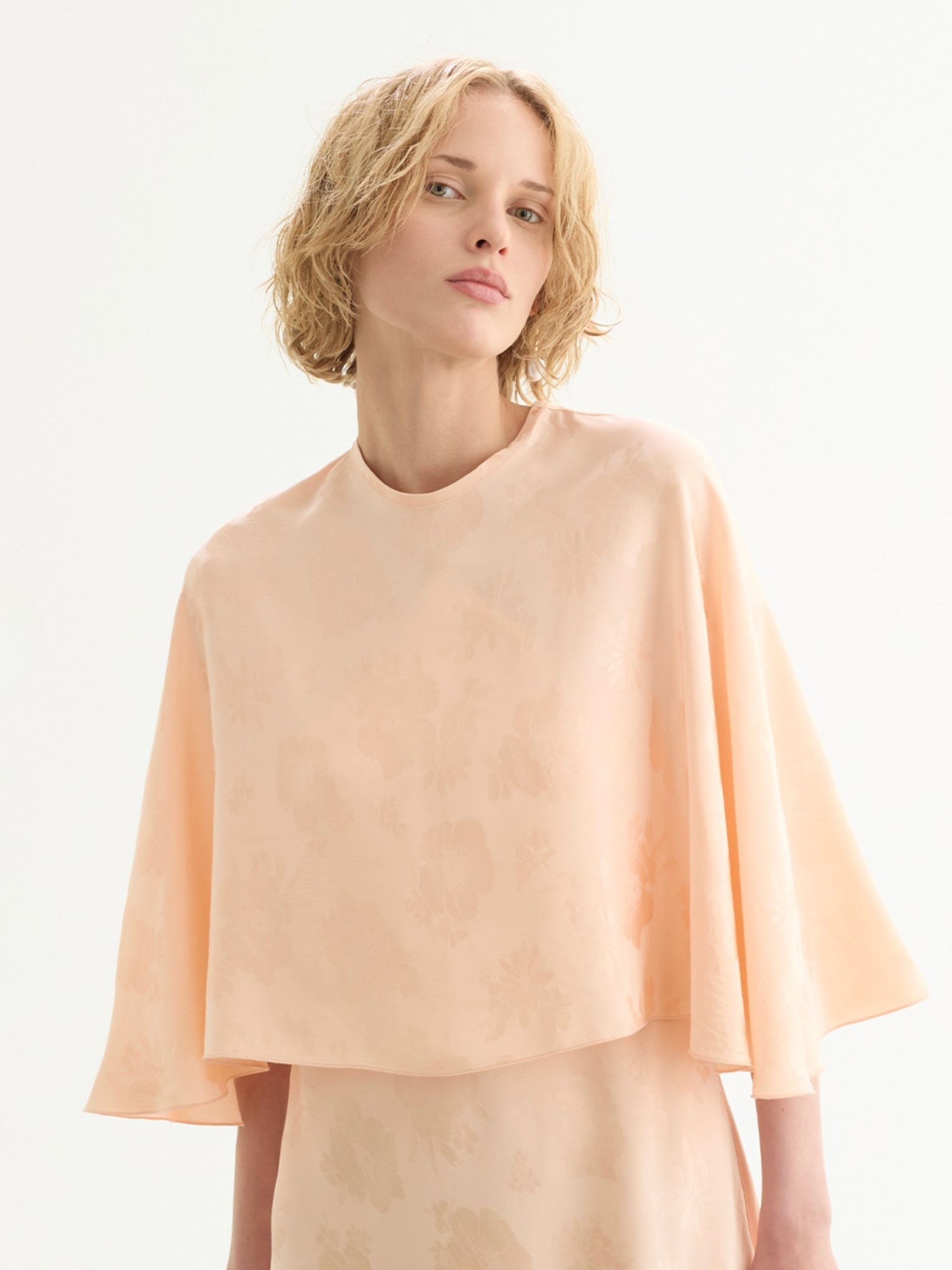 Fluid bouquet jacquard bias dress with cape, peach