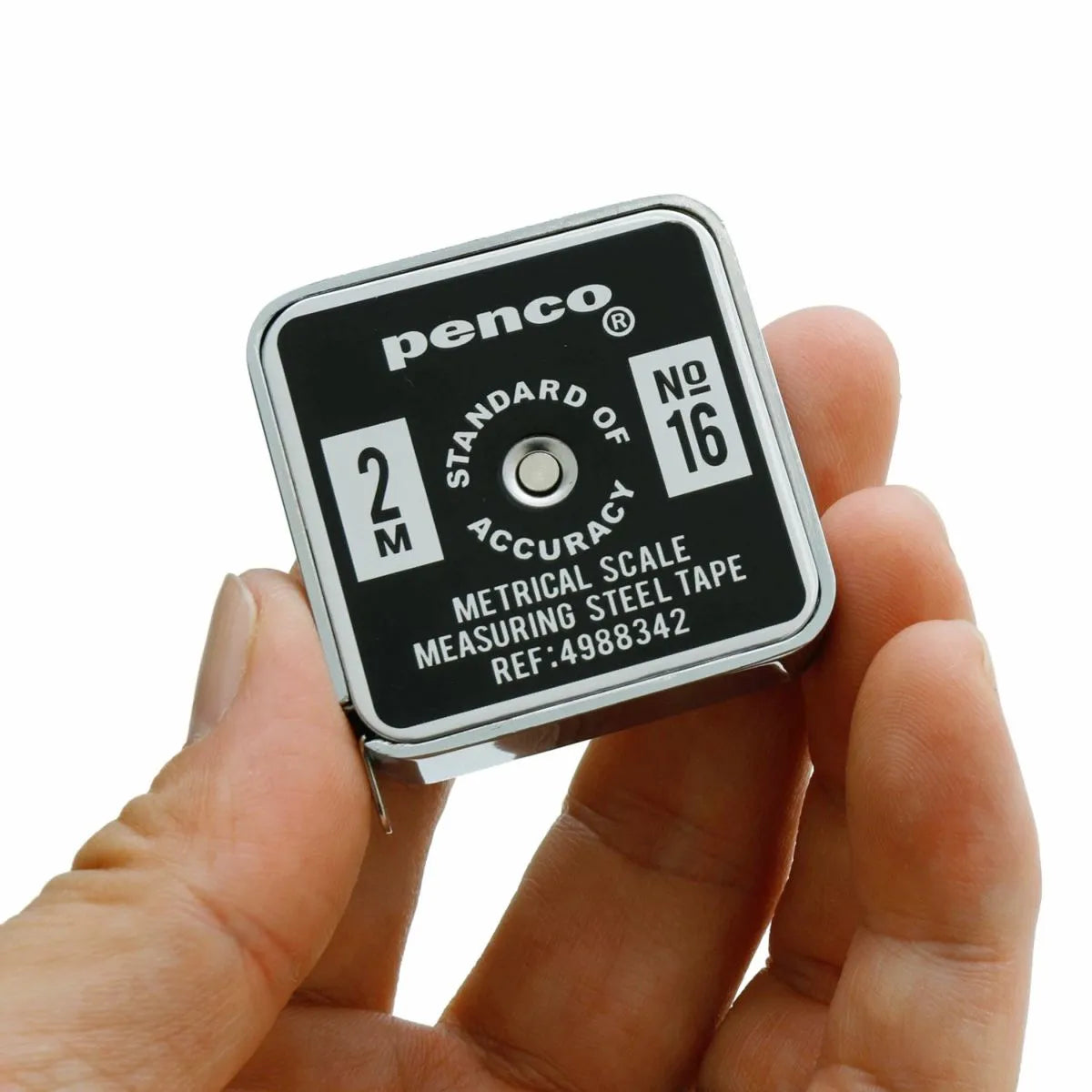Penco measuring steel tape held in a hand against a white background