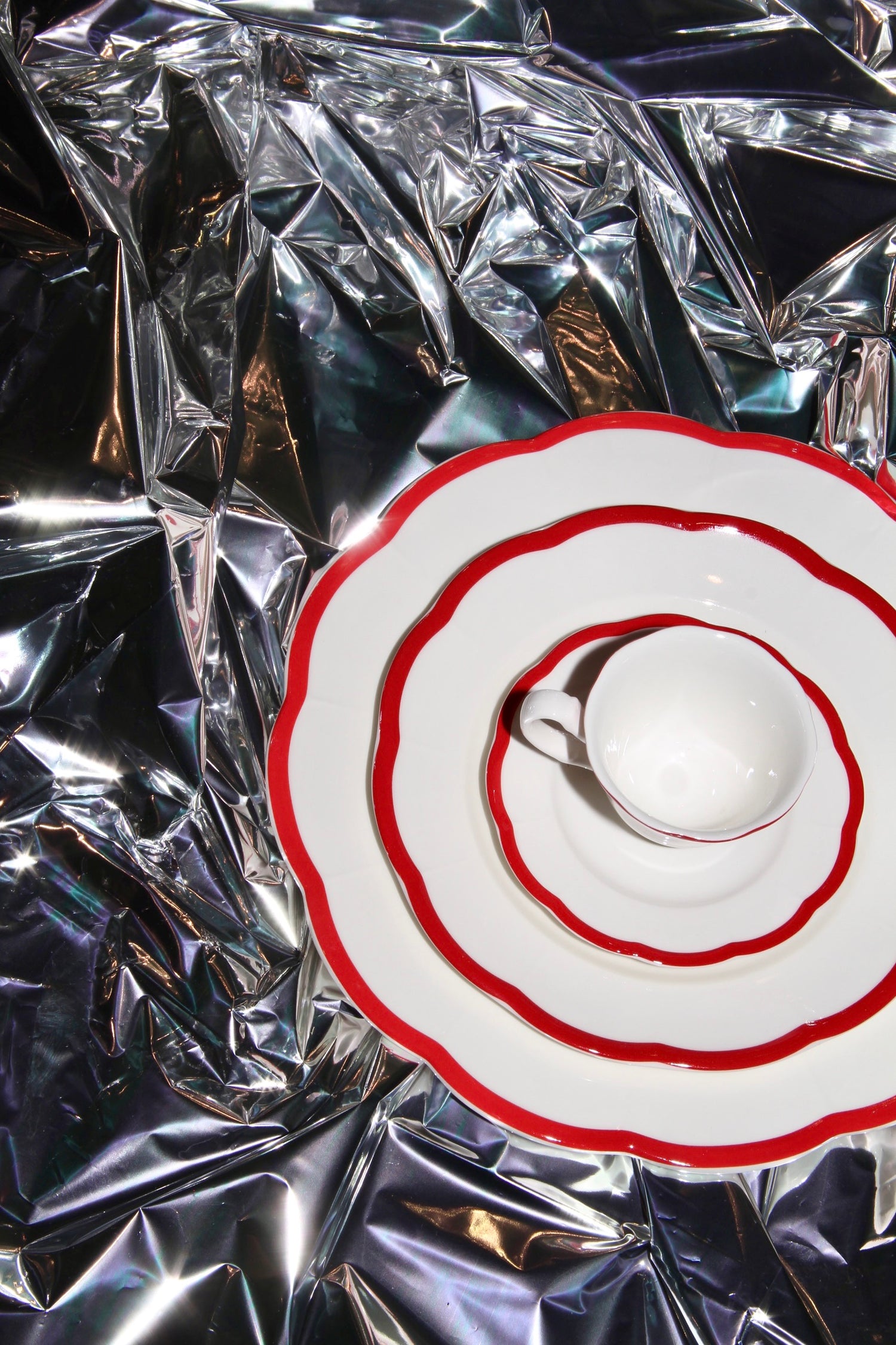 Red scalloped edge dinner plate