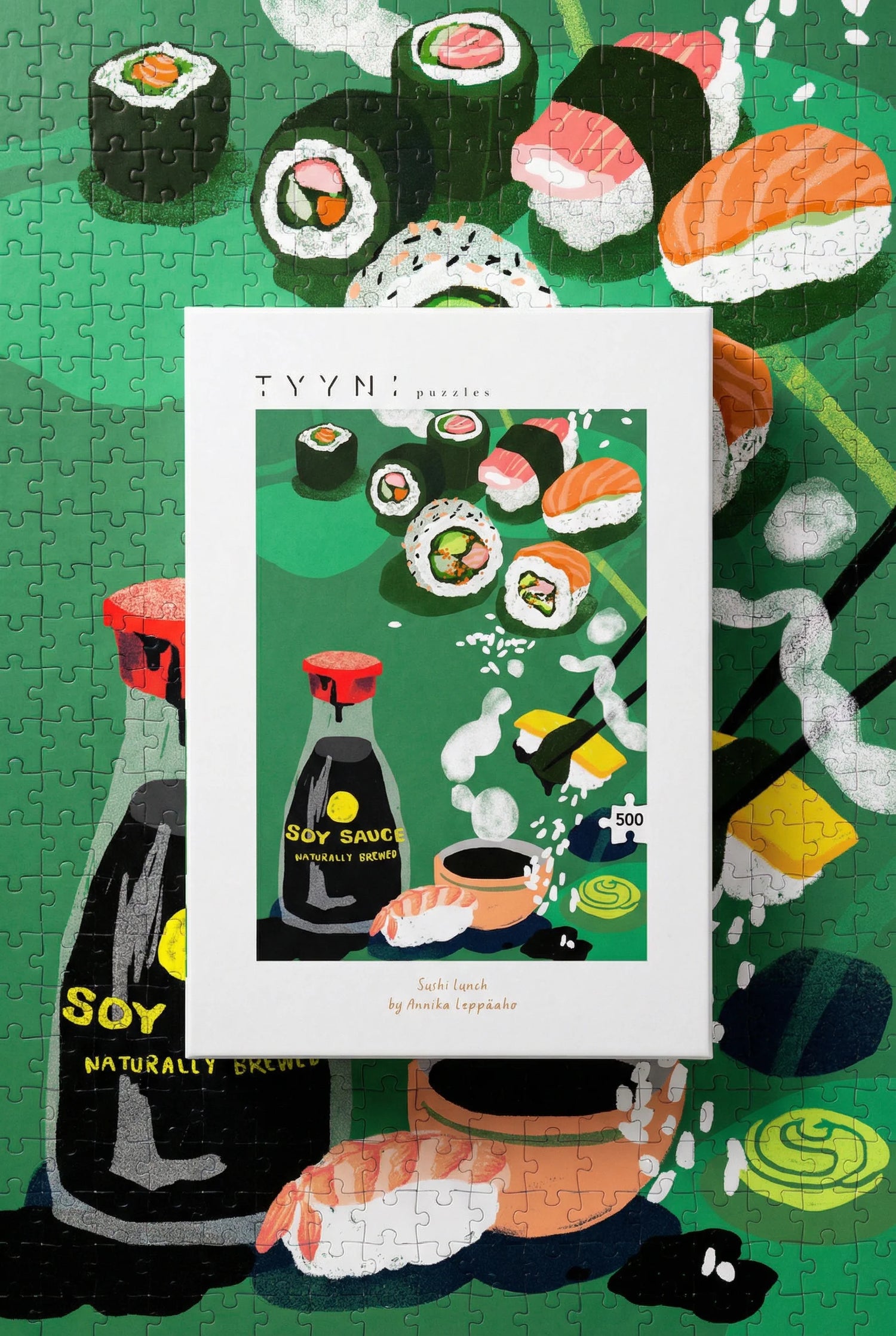 Sushi-themed puzzle with soy sauce bottle and various sushi pieces on a green background.