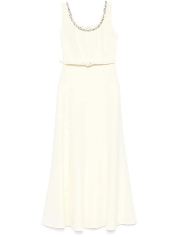 Light yellow dress with a pearl neckline on a white background