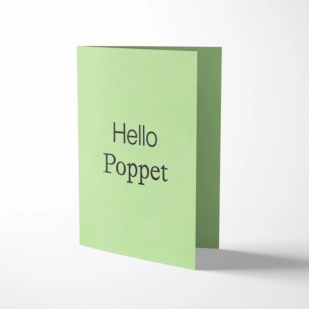 Light green greeting card with 'Hello Poppet' text on a white background