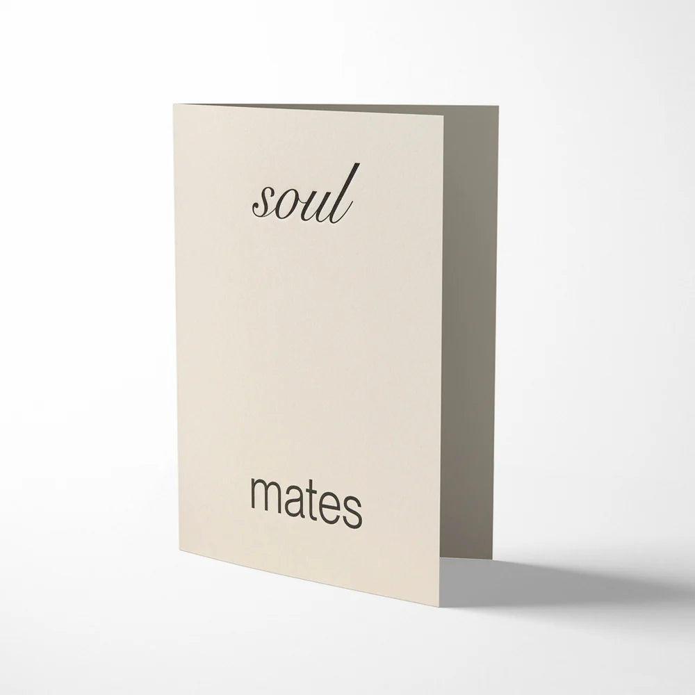 Card with 'soul mates' text on a white background
