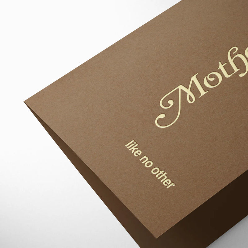 Brown greeting card with 'Mother' and 'like no other' text on a white background