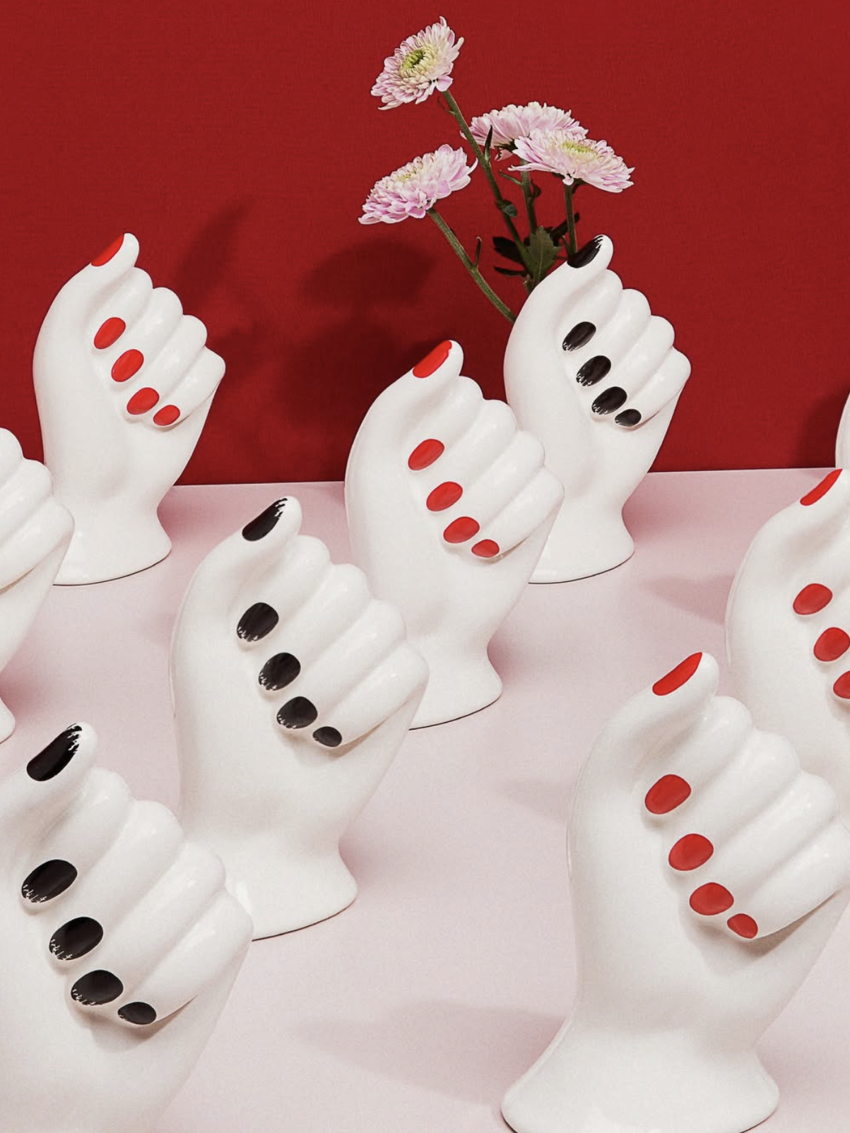 Red nail hand ceramic vase