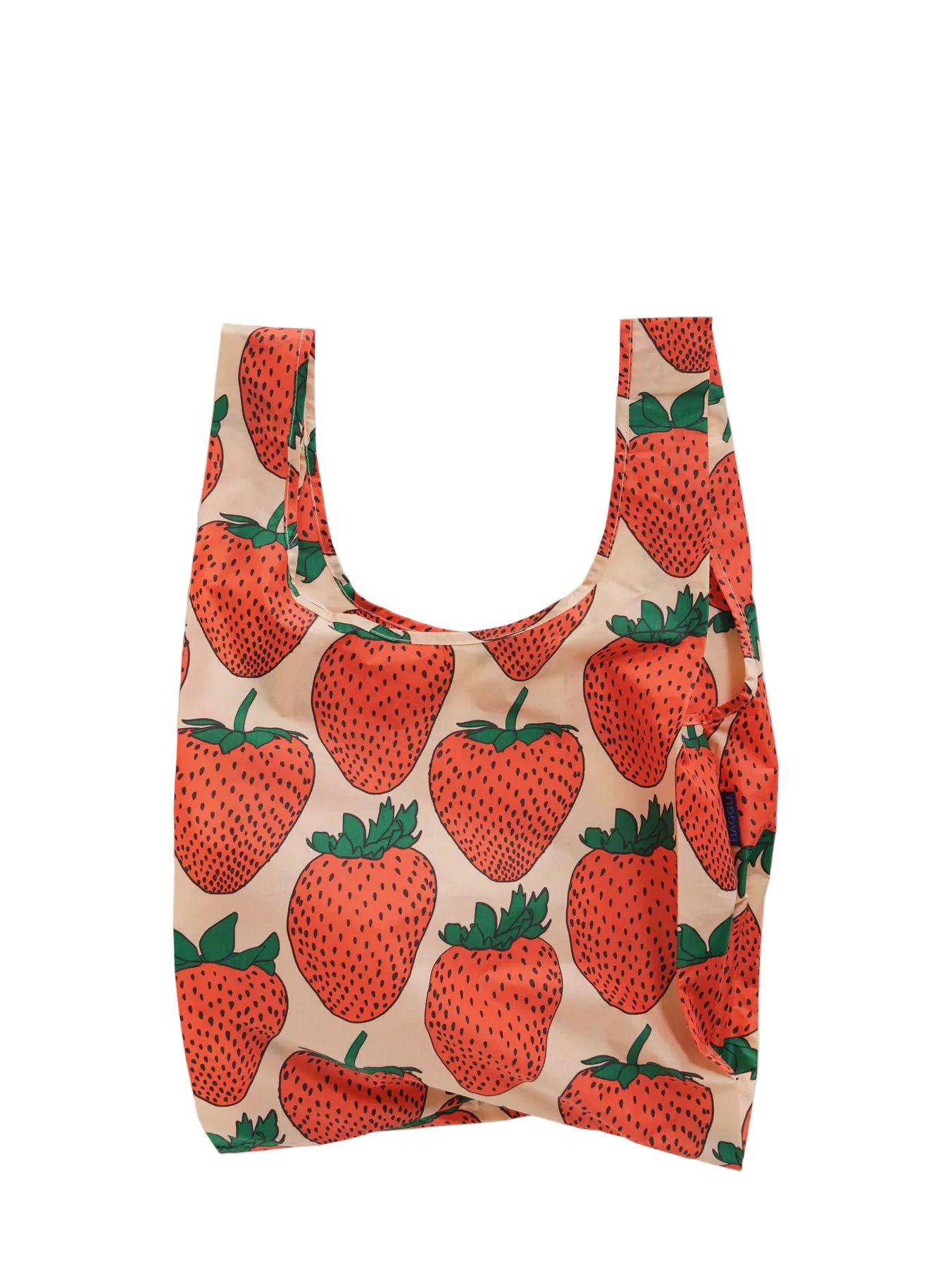 Reusable bag with strawberry pattern on a beige background