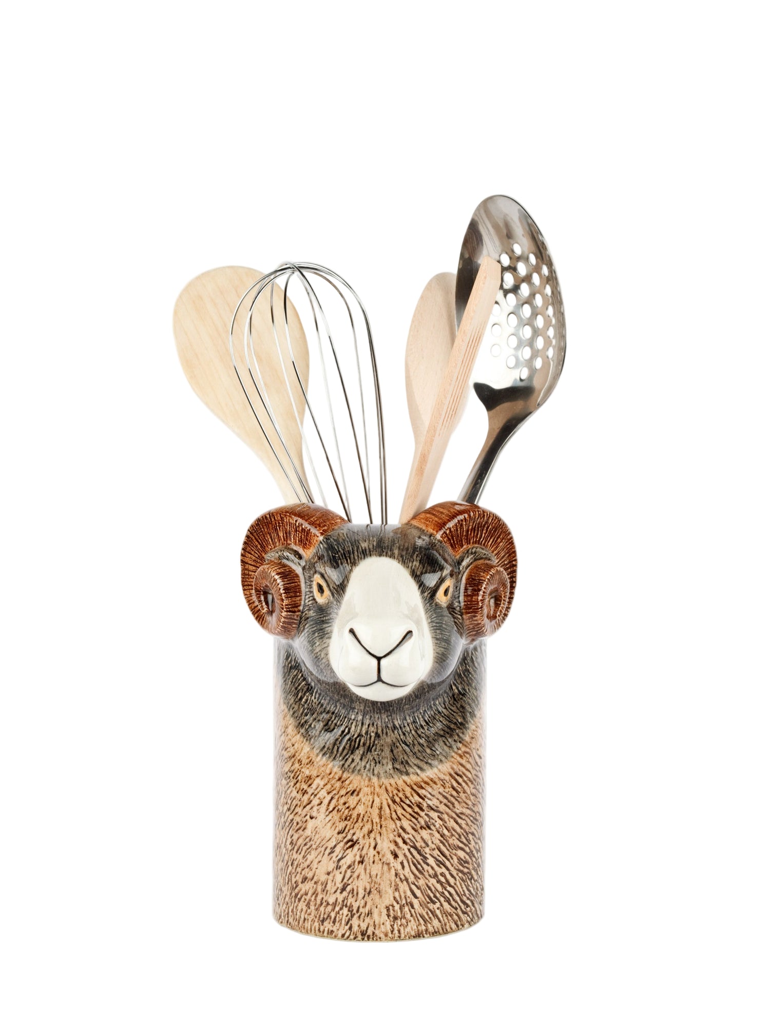 Sheep-shaped kitchen utensil holder with various utensils on a white background