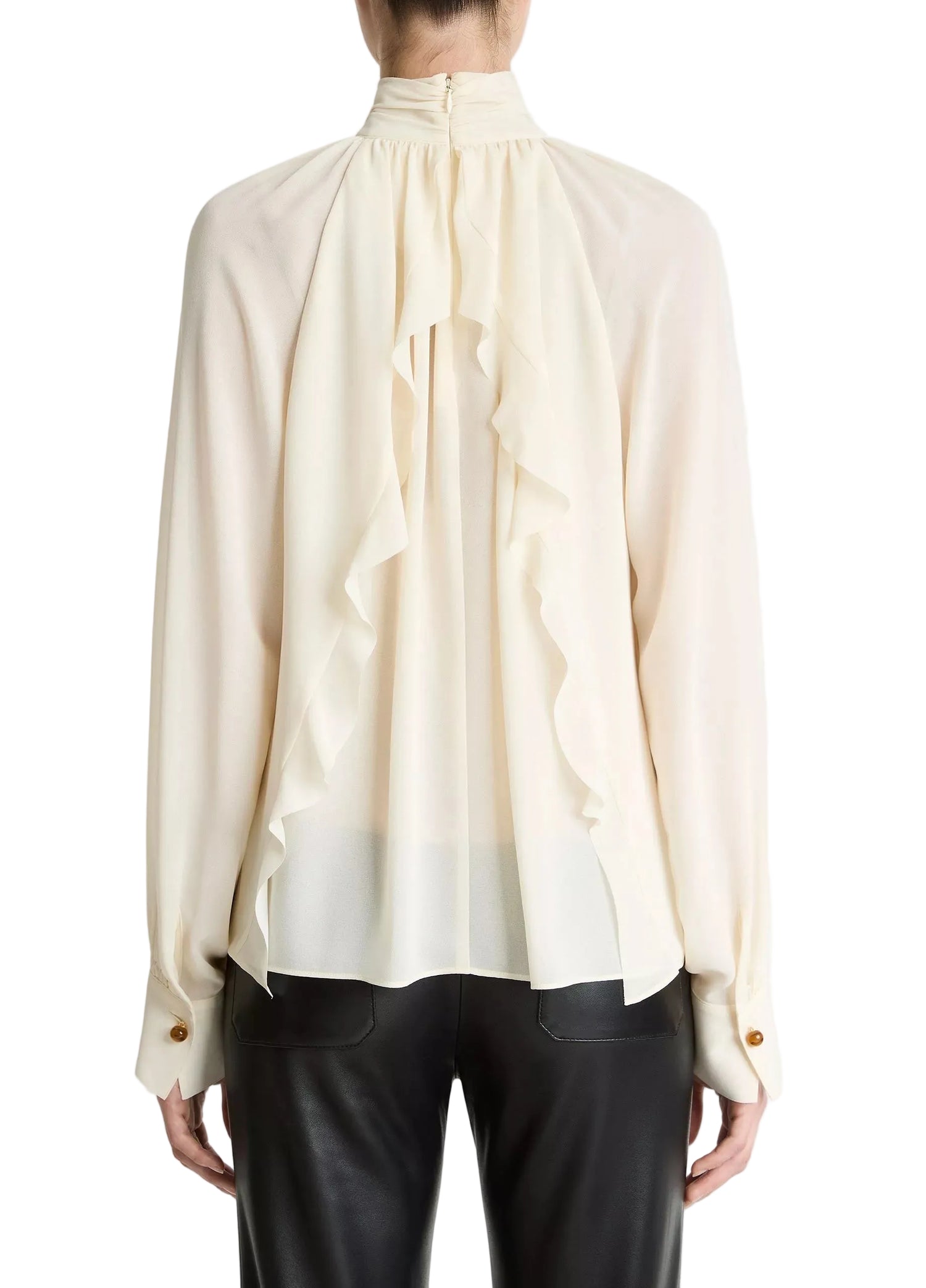 Woman wearing cream draped blouse from Vince