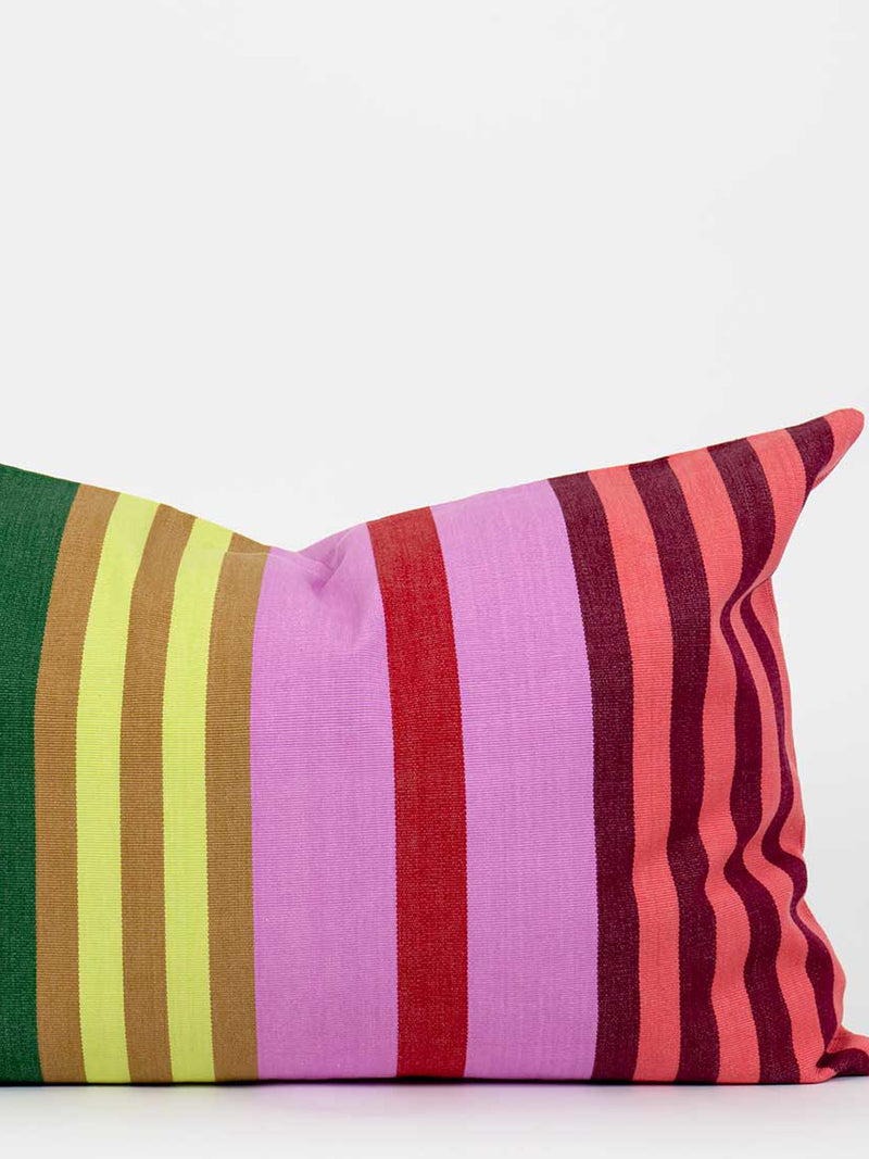 Colorful striped pillow on a white background