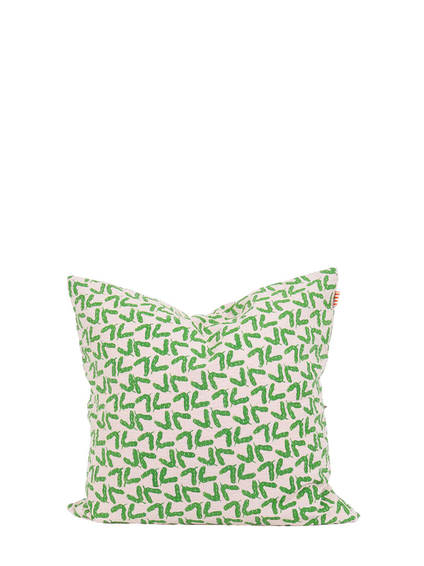 Green patterned pillow on a white background