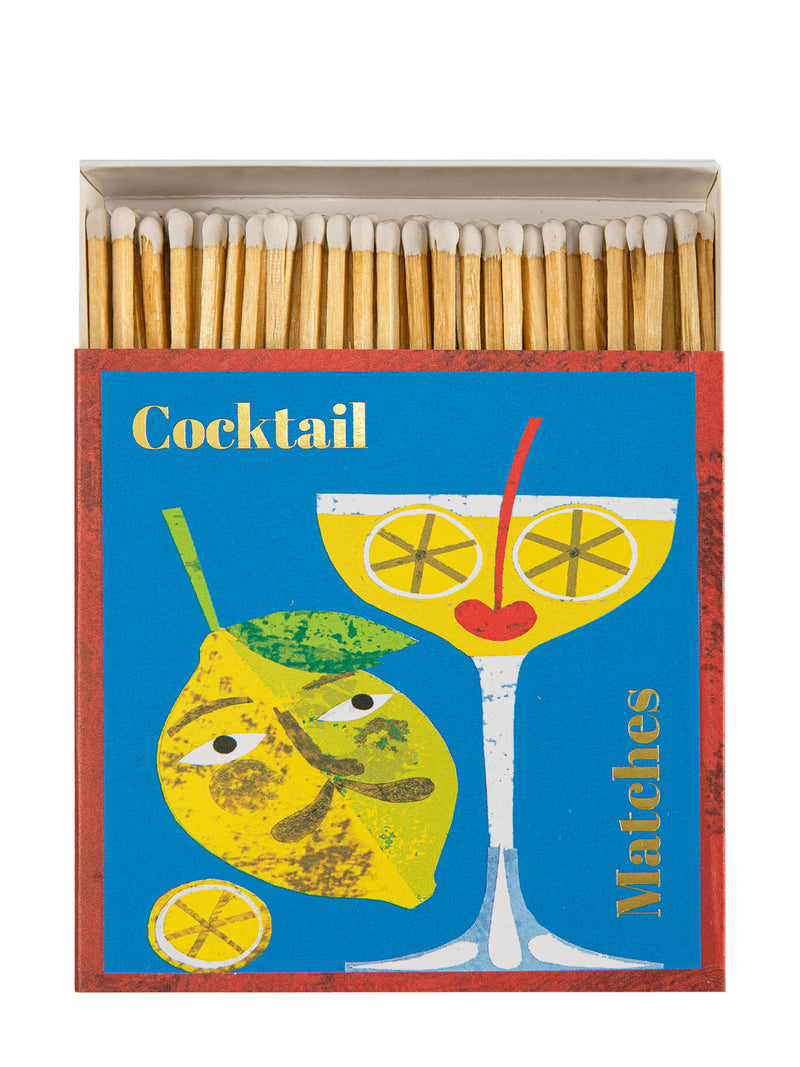 Matchbox with cocktail-themed design and matches inside