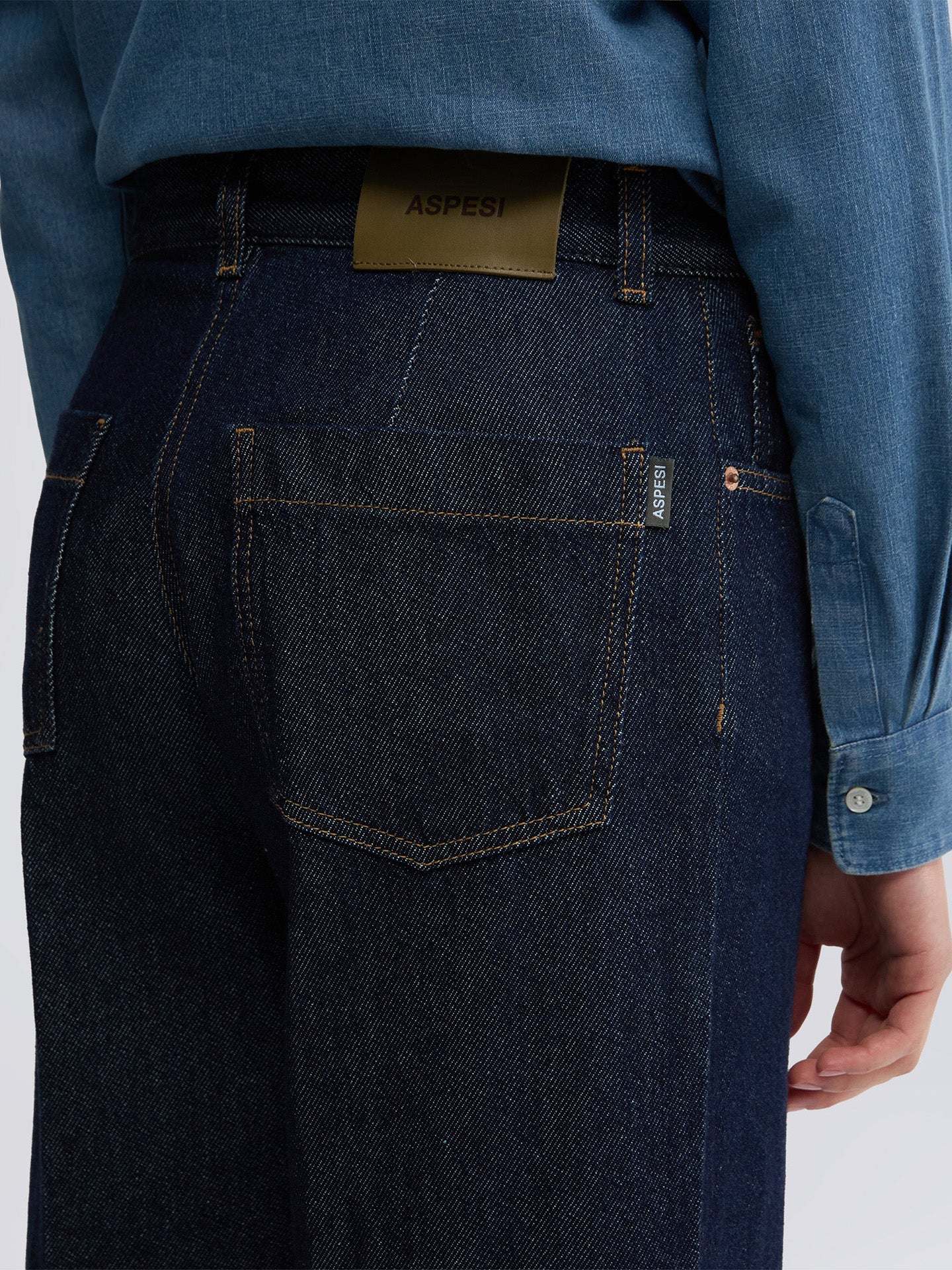 Wide-leg denim trousers