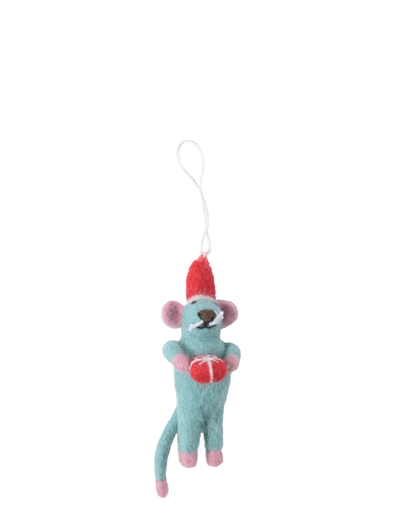 A small felted wool mouse ornament in light blue with pink ears, pink feet, and a red hat, holding a red gift box, suspended by a white string on a white background.