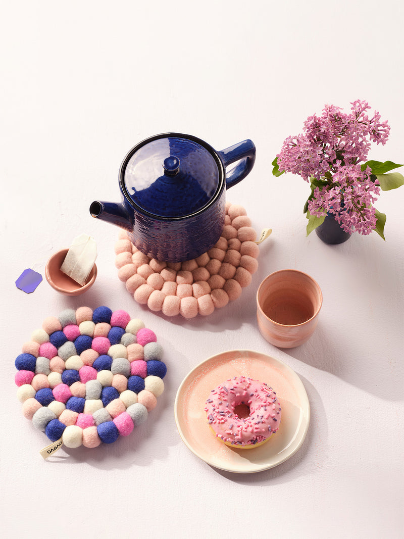 Round felted wool trivet, sakura