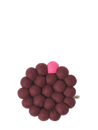 Bold round felted wool trivet, burgundy red