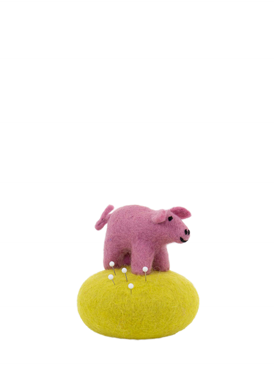 Pig on a stone pincushion