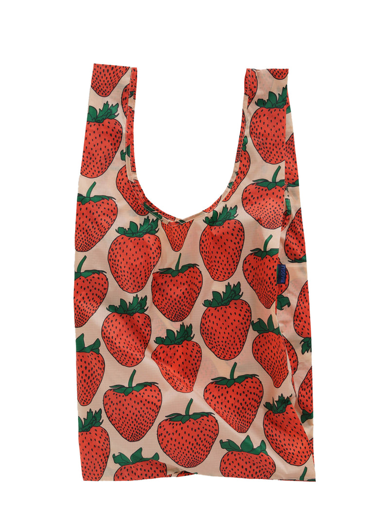 Reusable shopping bag with strawberry pattern on a beige background