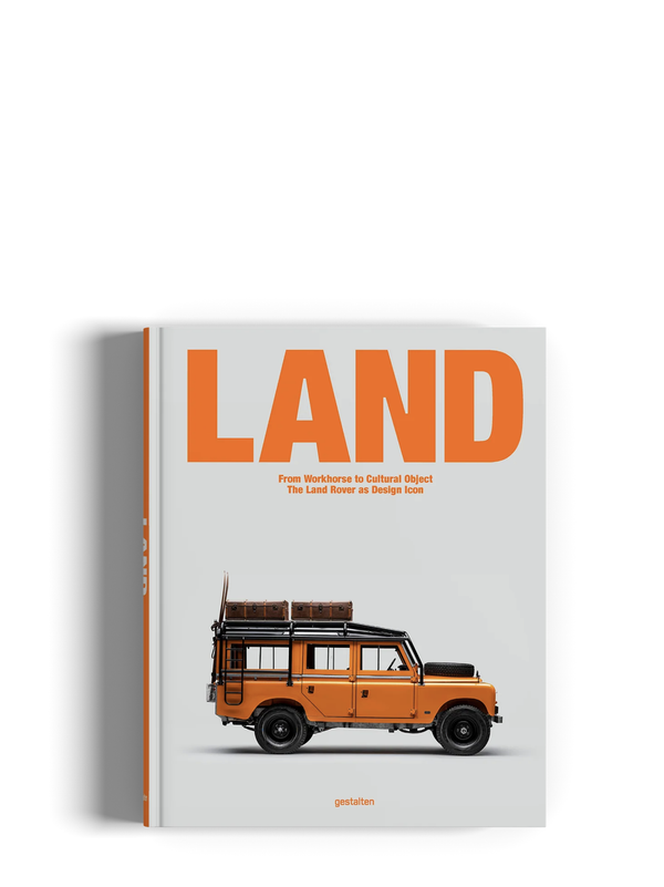 A book titled "LAND" with a large orange title on a light gray cover, featuring an orange vintage safari-style vehicle illustration near the bottom. The book is shown standing upright against a white background with a soft shadow.